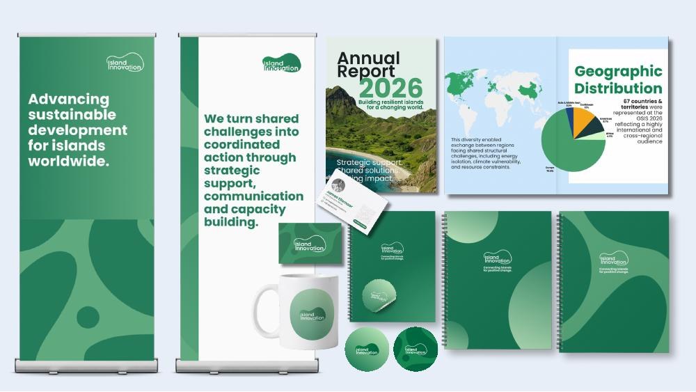 Island Innovation identity applied across a roll-up banner, stationery, annual report and merchandise